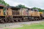 UP 6024 trails on a westbound coal train 